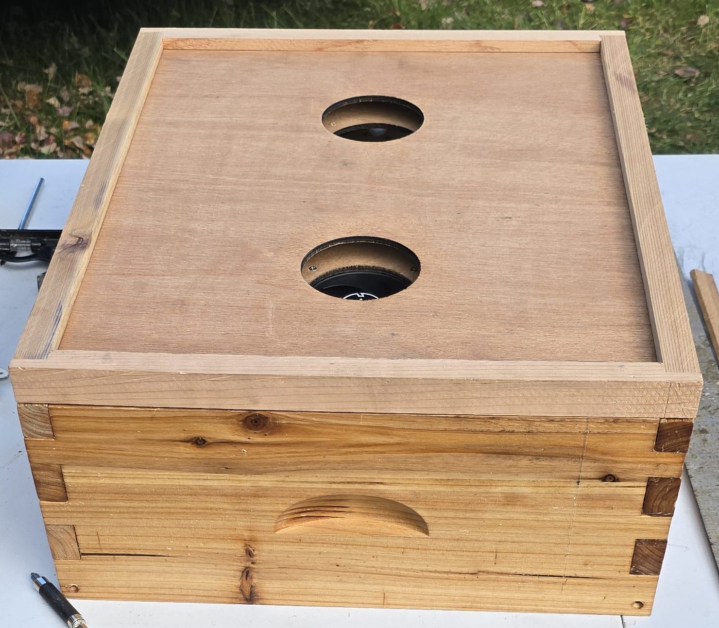 Bees contained at the entrance to prevent mite escape